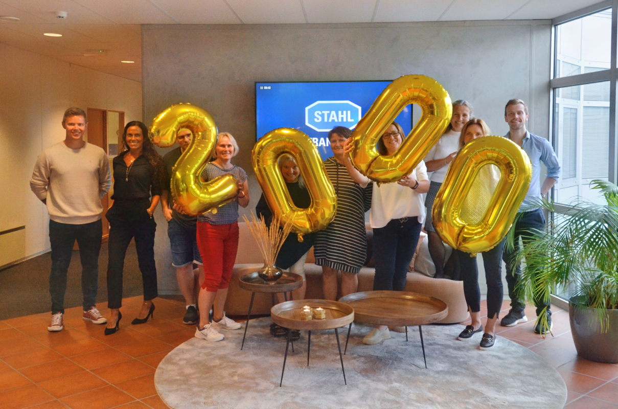Employees at the office and administration team at R. STAHL Tranberg celebrating 2000 followers on LinkedIn